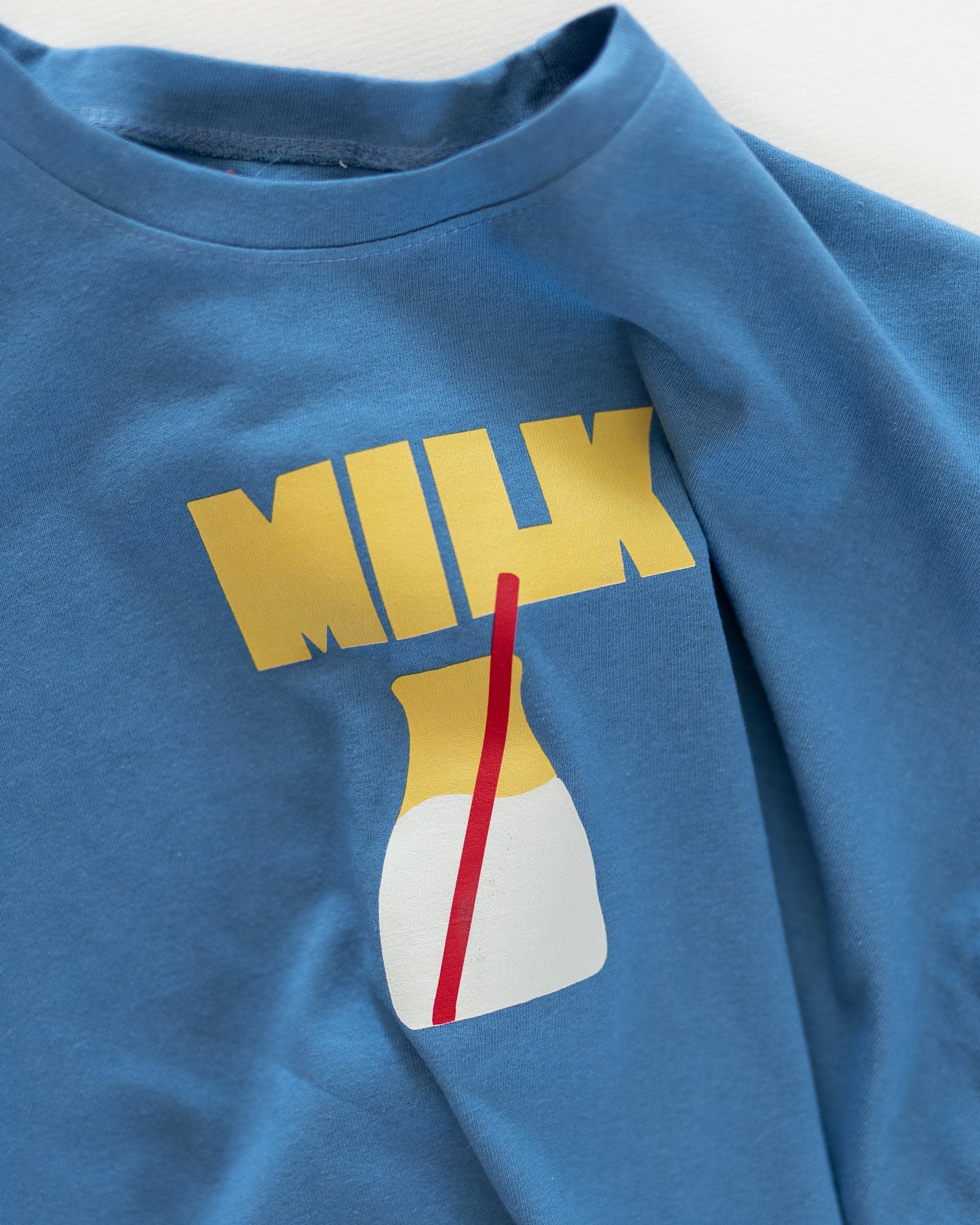 blue milk tee