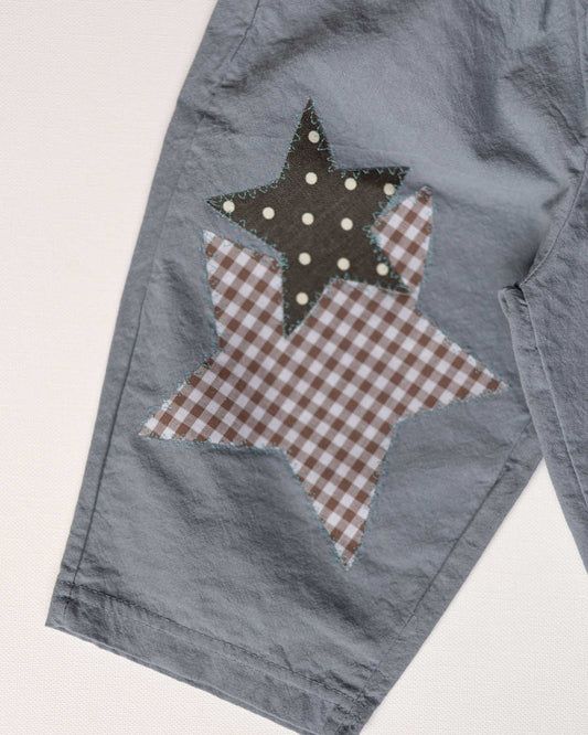 star patch pants