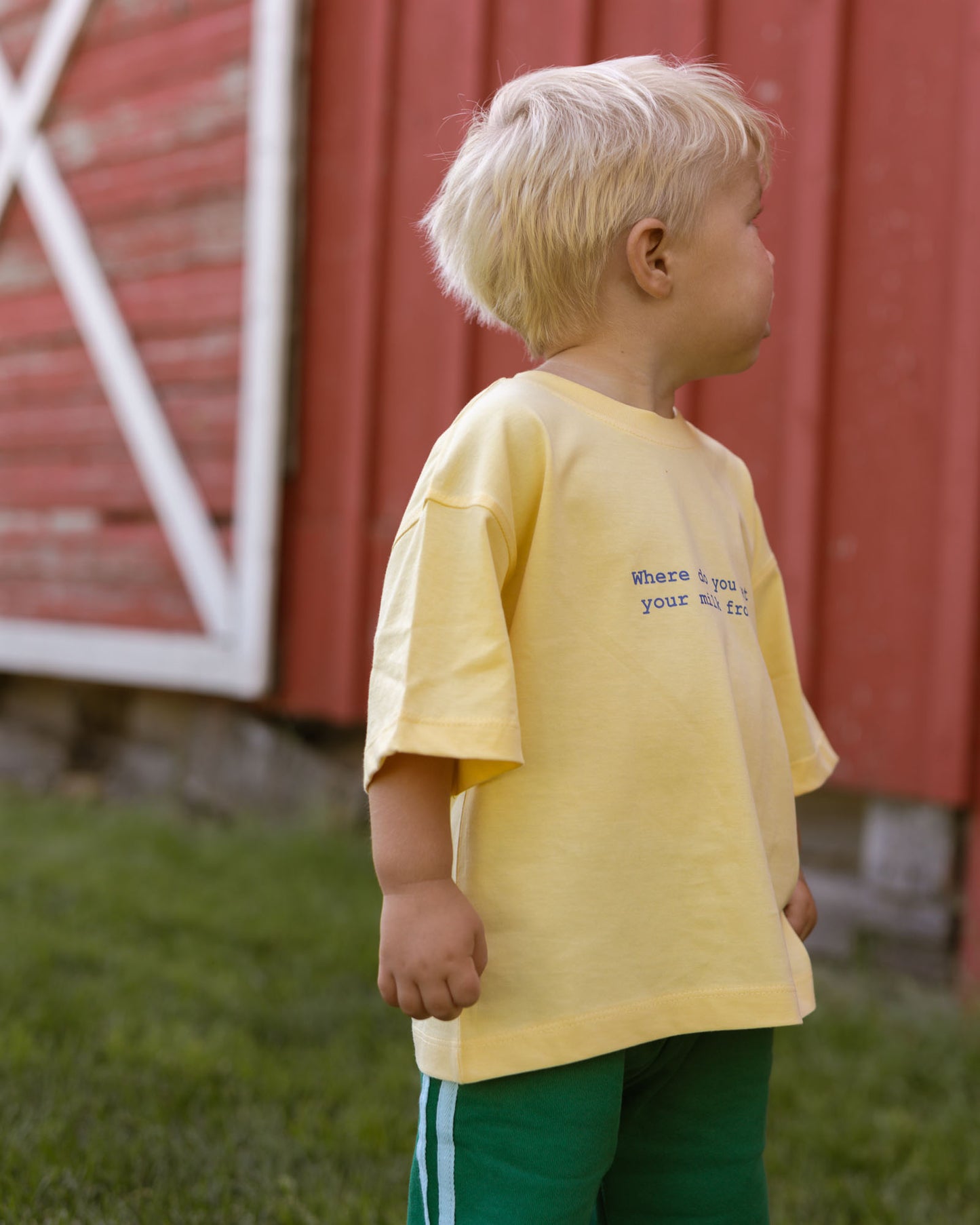 pale yellow graphic tee with blue words. aesthetic kids clothing
