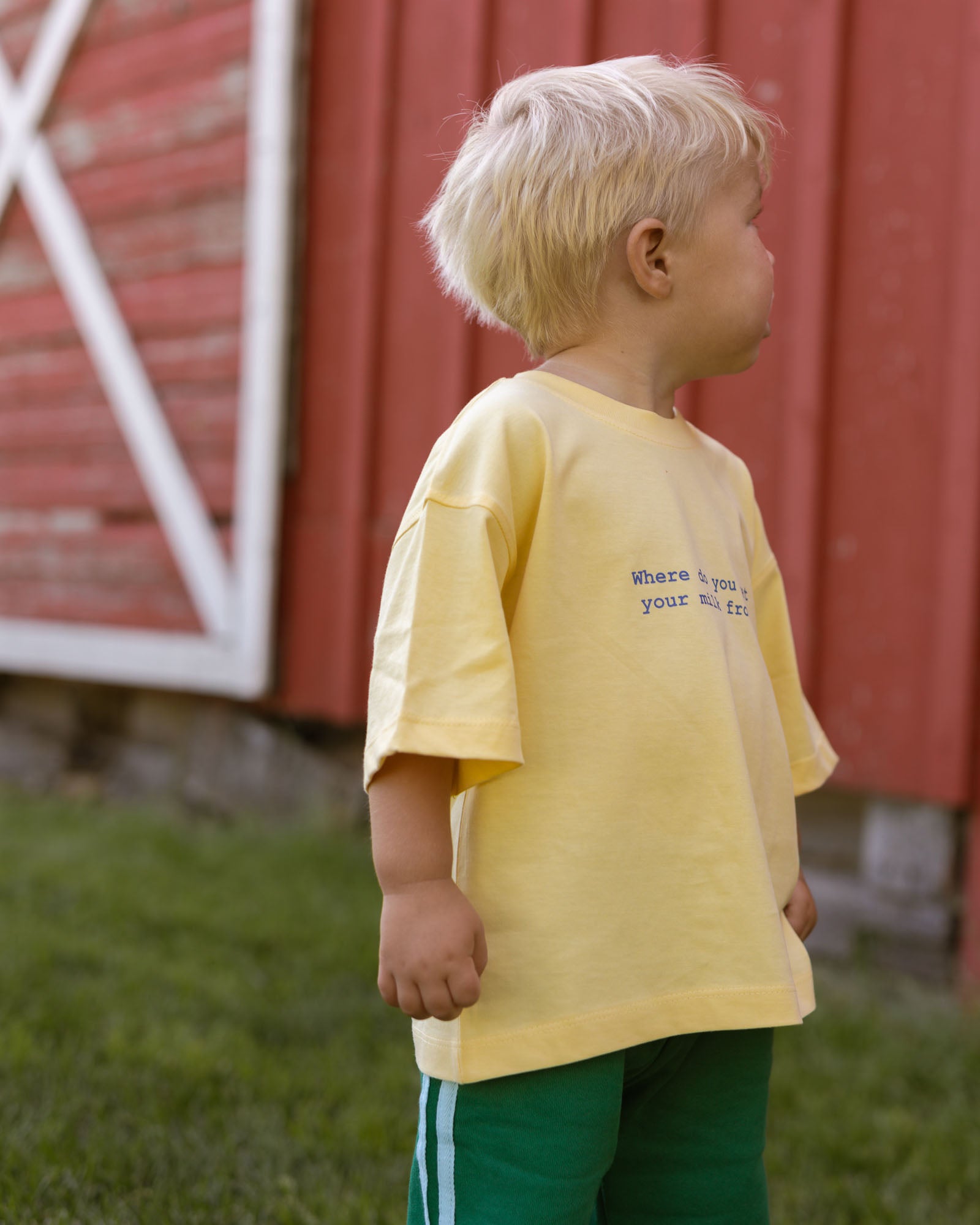pale yellow graphic tee with blue words. aesthetic kids clothing