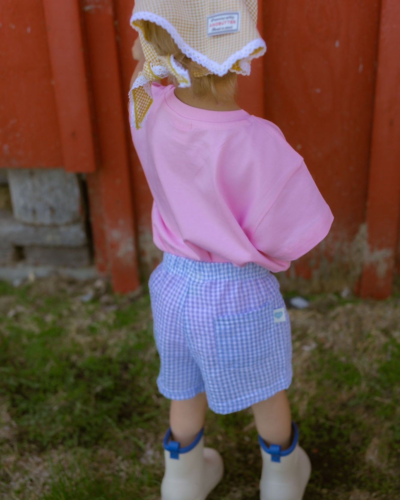 girl wearing colourful cotton outfit outside
