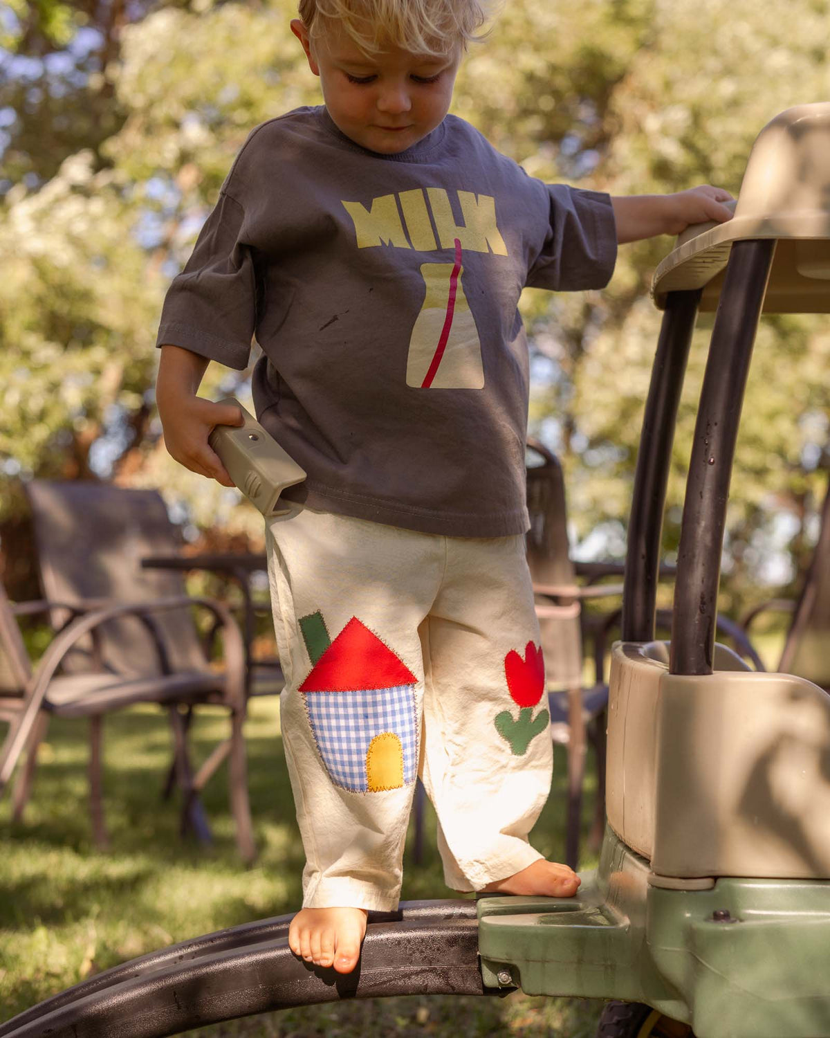 kids cotton patchwork pants with house and tulip knee patches. 