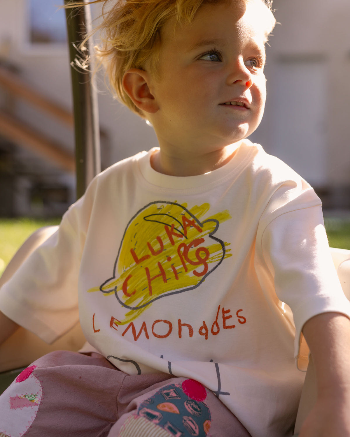 kids wearing a 100 % cotton graphic tee. 
